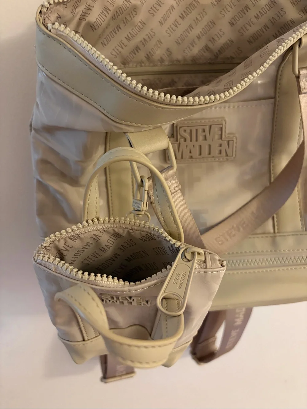 Steve Madden backpack featuring a smaller matching pouch attached